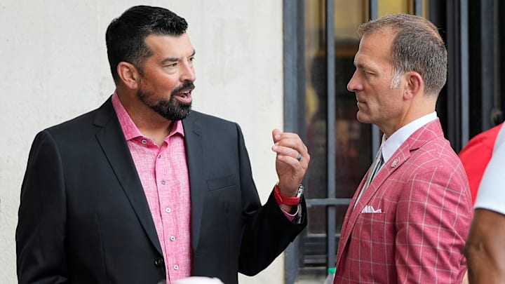 Aug 30, 2024; Columbus, OH, USA; Ohio State Buckeyes head coach Ryan Day and athletic director Ross Bjork attend the unveiling of a statue for former Buckeyes running back Archie Griffin outside Ohio Stadium.