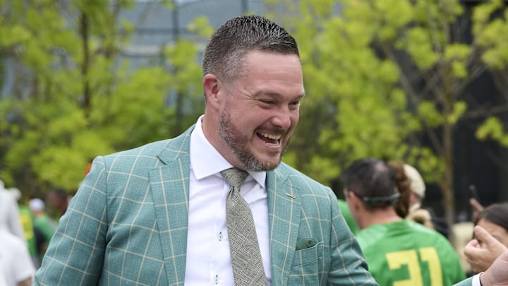 Sep 6, 2025; Eugene, Oregon, USA; Oregon Ducks head coach Dan Lanning greets fans before a game against the Oklahoma State Cowboys at Autzen Stadium. Mandatory Credit: Troy Wayrynen-Imagn Images