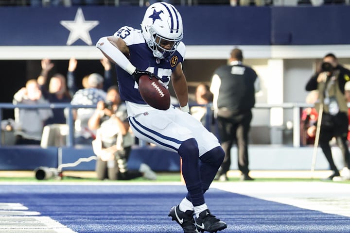 Dallas Cowboys running back Malik Davis celebrates after running for a touchdown against the Kansas City Chiefs.