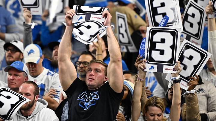 Detroit Lions fans hold up signs during the first half against the Dallas Cowboys at Ford Field Detroit Lions fans hold up signs during the first half against the Dallas Cowboys at Ford Field