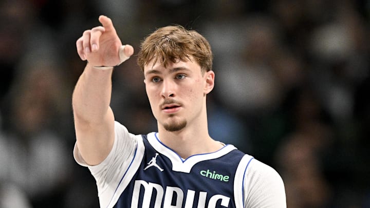 Dec 18, 2025; Dallas, Texas, USA; Dallas Mavericks forward Cooper Flagg (32) motions to his teammates during the second quarter against the Detroit Pistons at the American Airlines Center. Mandatory Credit: Jerome Miron-Imagn Images