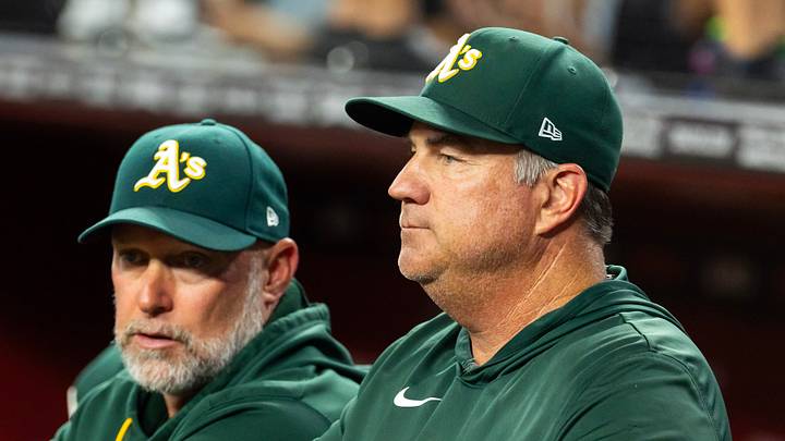 Jul 21, 2026; Phoenix, Arizona, USA; Athletics pitching coach Dan Hubbs (right) with manager Mark Kotsay against the Arizona Diamondbacks at Chase Field. Mandatory Credit: Mark J. Rebilas-Imagn Images Jul 21, 2026; Phoenix, Arizona, USA; Athletics pitching coach Dan Hubbs (right) with manager Mark Kotsay against the Arizona Diamondbacks at Chase Field. Mandatory Credit: Mark J. Rebilas-Imagn Images