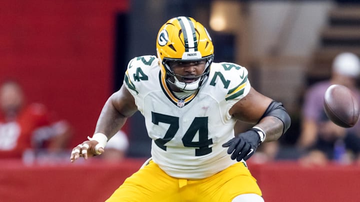Oct 19, 2025; Glendale, Arizona, USA; Green Bay Packers guard Jordan Morgan (77) and center Elgton Jenkins (74) against the Arizona Cardinals at State Farm Stadium. Mandatory Credit: Mark J. Rebilas-Imagn Images