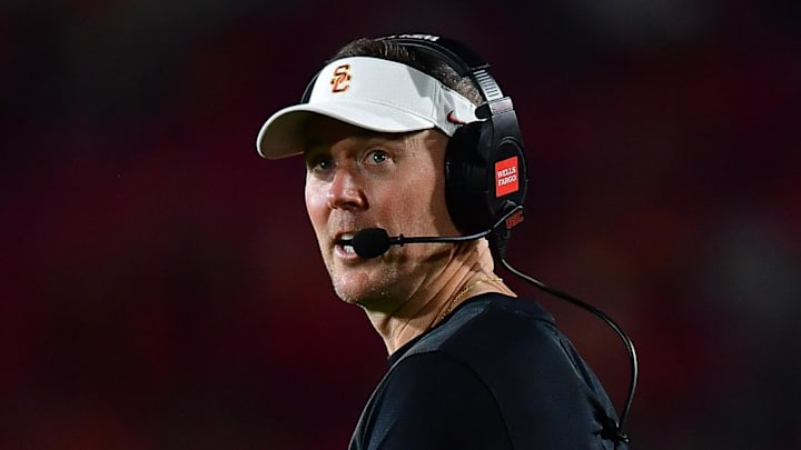 Sep 20, 2025; Los Angeles, California, USA; Southern California Trojans head coach Lincoln Riley watches game action against the Michigan State Spartans during the second half at the Los Angeles Memorial Coliseum. Mandatory Credit: Gary A. Vasquez-Imagn Images