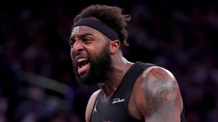 Dec 19, 2025; New York, New York, USA; New York Knicks center Mitchell Robinson (23) reacts after a dunk against the Philadelphia 76ers during the second quarter at Madison Square Garden. Mandatory Credit: Brad Penner-Imagn Images
