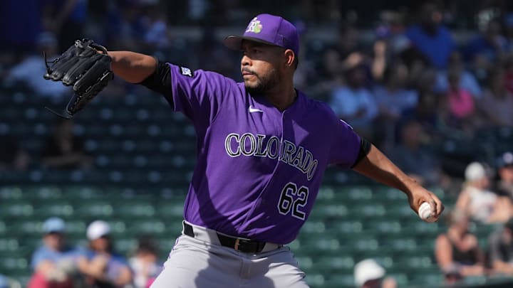 Colorado Rockies pitcher Jose Quintana (62) throws in spring training. 