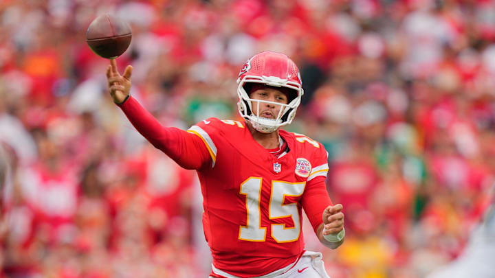 Sep 14, 2025; Kansas City, Missouri, USA; Kansas City Chiefs quarterback Patrick Mahomes (15) passes the ball against the Philadelphia Eagles during the third quarter of the game at GEHA Field at Arrowhead Stadium. Mandatory Credit: Jay Biggerstaff-Imagn Images