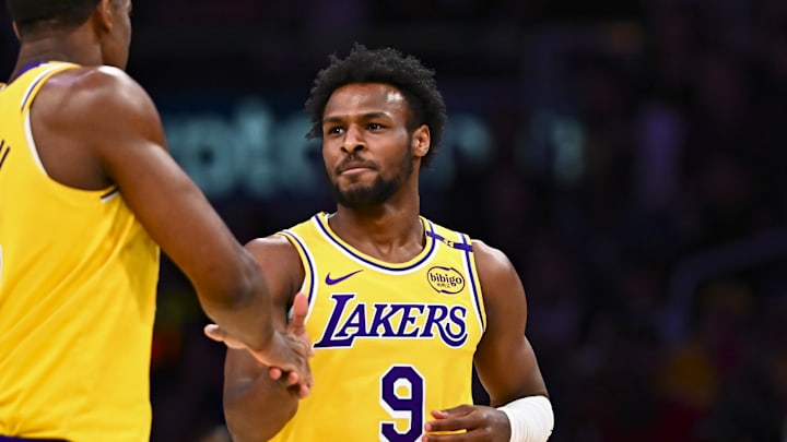 Apr 11, 2025; Los Angeles, California, USA; Los Angeles Lakers guard Bronny James Jr. (9) celebrates with center Trey Jemison III (55) after scoring against the Houston Rockets during the second half at Crypto.com Arena. Mandatory Credit: Jonathan Hui-Imagn Images Apr 11, 2025; Los Angeles, California, USA; Los Angeles Lakers guard Bronny James Jr. (9) celebrates with center Trey Jemison III (55) after scoring against the Houston Rockets during the second half at Crypto.com Arena. Mandatory Credit: Jonathan Hui-Imagn Images