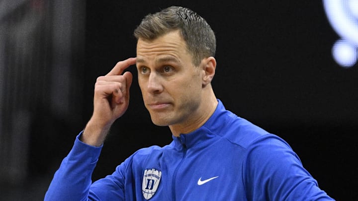 Jan 6, 2026; Louisville, Kentucky, USA;  Duke Blue Devils head coach Jon Scheyer reacts during the second half against the Louisville Cardinals at KFC Yum! Center. Duke defeated Louisville 84-73. Mandatory Credit: Jamie Rhodes-Imagn Images