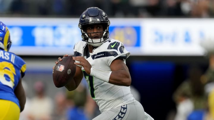 Nov 19, 2023; Inglewood, California, USA; Seattle Seahawks quarterback Geno Smith (7) looks to pass against the Los Angeles Rams in the second quarter at SoFi Stadium. Mandatory Credit: Kirby Lee-USA TODAY Sports Nov 19, 2023; Inglewood, California, USA; Seattle Seahawks quarterback Geno Smith (7) looks to pass against the Los Angeles Rams in the second quarter at SoFi Stadium. Mandatory Credit: Kirby Lee-USA TODAY Sports