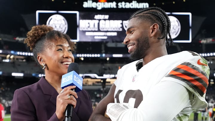 Nov 23, 2025; Paradise, Nevada, USA; CBS Sports reporter Tiffany Blackman (left) interviews Cleveland Browns quarterback Shedeur Sanders (12) after the game against the Las Vegas Raiders at Allegiant Stadium. Mandatory Credit: Kirby Lee-Imagn Images