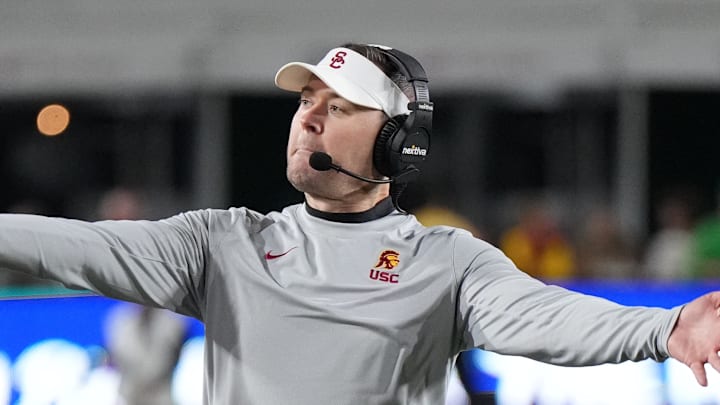 Nov 26, 2022; Los Angeles, California, USA; Southern California Trojans head coach Lincoln Riley celebrates in the fourth quarter against the Notre Dame Fighting Irish at United Airlines Field at Los Angeles Memorial Coliseum. Mandatory Credit: Kirby Lee-Imagn Images