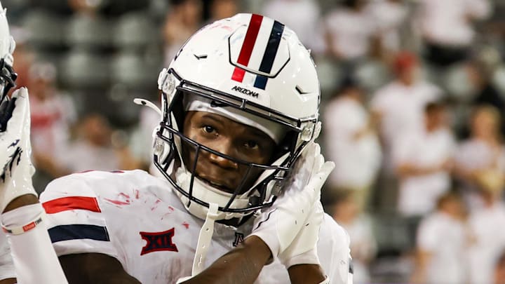 Aug 31, 2024; Tucson, Arizona, USA; Arizona Wildcats running back Jacory Croskey-Merritt (1) celebrates touchdown with Arizona Wildcats wide receiver Chris Hunter (16) during fourth quarter at Arizona Stadium. Mandatory Credit: Aryanna Frank-Imagn Images