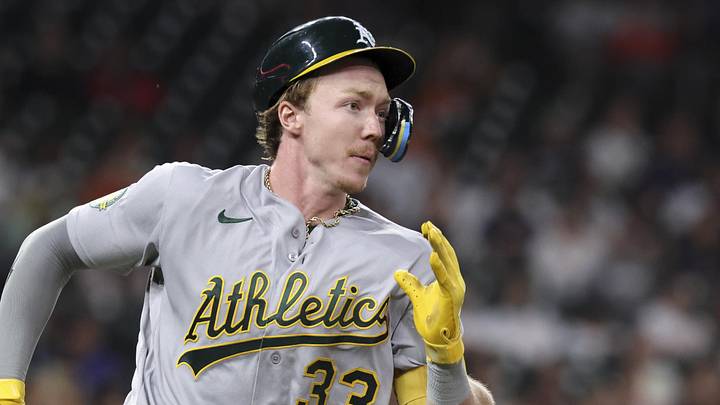 Jun 5, 2026; Houston, Texas, USA; Athletics center fielder Henry Bolte (33) runs to first base on a double during the sixth inning against the Houston Astros at Daikin Park. Mandatory Credit: Troy Taormina-Imagn Images