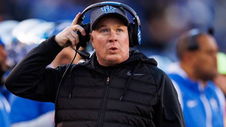 Nov 19, 2022; Lexington, Kentucky, USA; Kentucky Wildcats head coach Mark Stoops looks on during the first quarter against the Georgia Bulldogs at Kroger Field. Mandatory Credit: Jordan Prather-USA TODAY Sports Nov 19, 2022; Lexington, Kentucky, USA; Kentucky Wildcats head coach Mark Stoops looks on during the first quarter against the Georgia Bulldogs at Kroger Field. Mandatory Credit: Jordan Prather-USA TODAY Sports