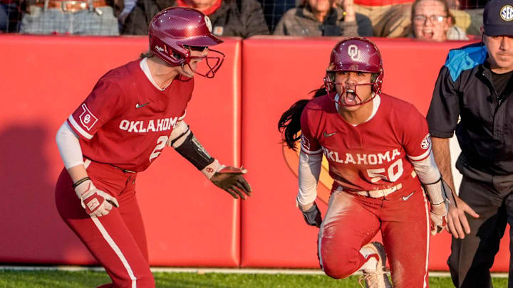 Oklahoma second baseman Ailana Agbayani scores against Texas Oklahoma second baseman Ailana Agbayani scores against Texas