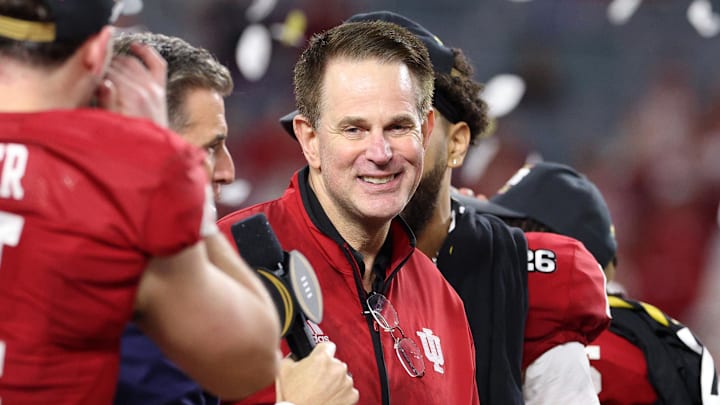 Indiana Hoosiers coach Curt Cignetti celebrates after the College Football Playoff National Championship game at Hard Rock Stadium. 
