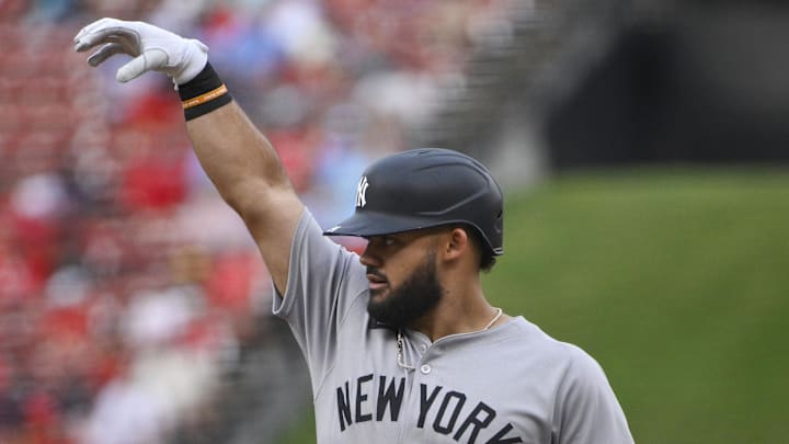 Aug 16, 2025; St. Louis, Missouri, USA;  New York Yankees left fielder Jasson Dominguez (24) reacts after hitting a one run single against the St. Louis Cardinals during the first inning at Busch Stadium. Mandatory Credit: Jeff Curry-Imagn Images