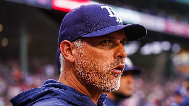 Jun 10, 2025; Boston, Massachusetts, USA; Tampa Bay Rays manager Kevin Cash (16) watches from the dugout against the Boston Red Sox in the first inning at Fenway Park. 