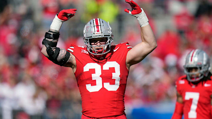 Ohio State Buckeyes defensive end Jack Sawyer (33) tries to get the crowd pumped up against Nebraska Cornhuskers during the second quarter of their game at Ohio Stadium on Oct 26, 2024, in Columbus.