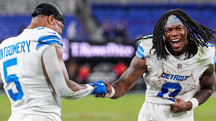 Detroit Lions running back David Montgomery (5), left, and running back Jahmyr Gibbs (0) celebrates 38-30 win over Ravens