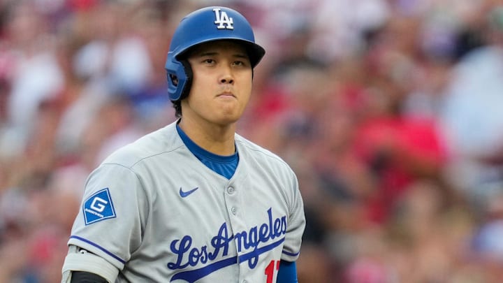 Los Angeles Dodgers designated hitter Shohei Ohtani (17) returns to the dugout after striking out in the first inning of the MLB National League game between the Cincinnati Reds and the Los Angeles Dodgers at Great American Ball Park in downtown Cincinnati on Tuesday, July 29, 2025. The Reds led 3-2 after four innings. Los Angeles Dodgers designated hitter Shohei Ohtani (17) returns to the dugout after striking out in the first inning of the MLB National League game between the Cincinnati Reds and the Los Angeles Dodgers at Great American Ball Park in downtown Cincinnati on Tuesday, July 29, 2025. The Reds led 3-2 after four innings.