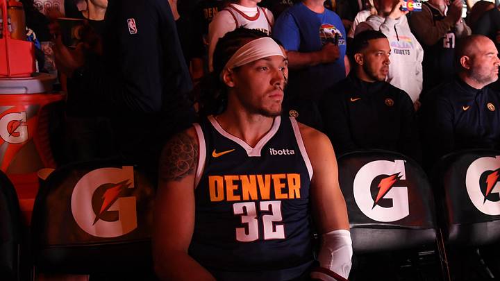 Oct 25, 2025; Denver, Colorado, USA; Denver Nuggets forward Aaron Gordon (32) waits on the bench during player introductions before the game against the Phoenix Suns at Ball Arena. Mandatory Credit: Christopher Hanewinckel-Imagn Images Oct 25, 2025; Denver, Colorado, USA; Denver Nuggets forward Aaron Gordon (32) waits on the bench during player introductions before the game against the Phoenix Suns at Ball Arena. Mandatory Credit: Christopher Hanewinckel-Imagn Images