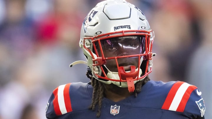 Dec 15, 2024; Glendale, Arizona, USA; New England Patriots running back Rhamondre Stevenson (38) against the Arizona Cardinals at State Farm Stadium. 