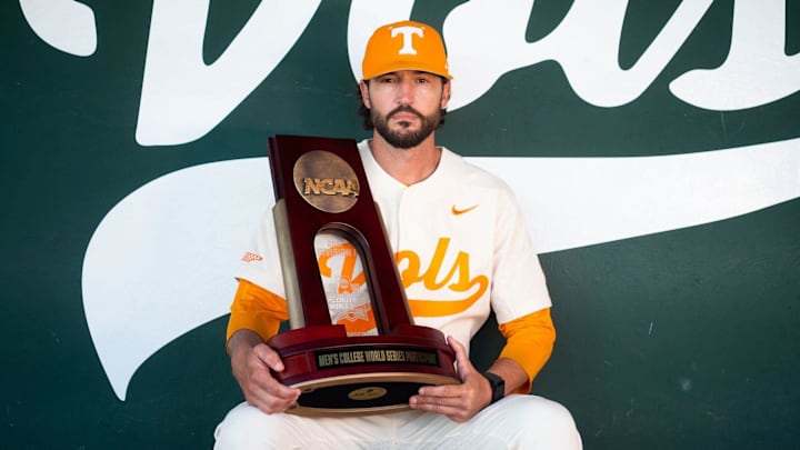 Tennessee baseball head coach Tony Vitello, Knox News Sportsperson of the Year, poses for a portrait with the team's 2021 College World Series participant trophy at Lindsey Nelson Stadium in Knoxville, Tenn. on Thursday, Dec. 16, 2021. Tennessee baseball head coach Tony Vitello, Knox News Sportsperson of the Year, poses for a portrait with the team's 2021 College World Series participant trophy at Lindsey Nelson Stadium in Knoxville, Tenn. on Thursday, Dec. 16, 2021.