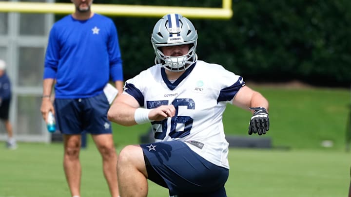 Dallas Cowboys center Cooper Beebe (56) goes through a drill during practice at the Ford Center at the Star Training Facility Dallas Cowboys center Cooper Beebe (56) goes through a drill during practice at the Ford Center at the Star Training Facility