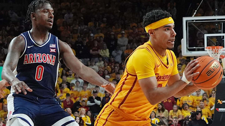 Iowa State Cyclones guard Tamin Lipsey (3) passes the ball around Arizona Wildcats guard Jaden Bradley (0) during the first half in the Big-12 men’s basketball showdown at Hilton Coliseum on Saturday March 1, 2025 in Ames, Iowa.