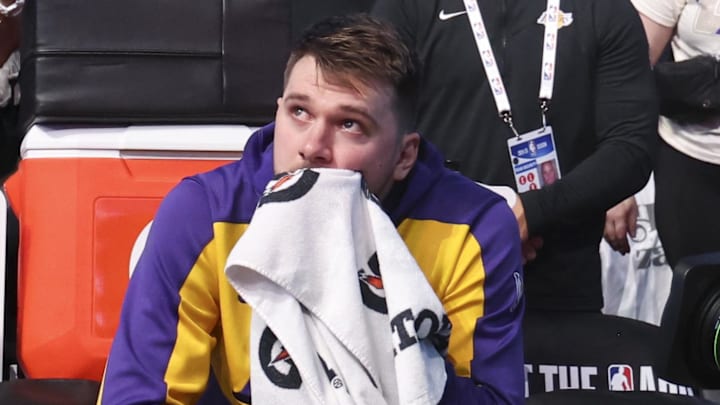 Apr 9, 2025; Dallas, Texas, USA; Los Angeles Lakers guard Luka Doncic (77) reacts while watching a tribute video before the game against the Dallas Mavericks at American Airlines Center. Mandatory Credit: Kevin Jairaj-Imagn Images Apr 9, 2025; Dallas, Texas, USA; Los Angeles Lakers guard Luka Doncic (77) reacts while watching a tribute video before the game against the Dallas Mavericks at American Airlines Center. Mandatory Credit: Kevin Jairaj-Imagn Images