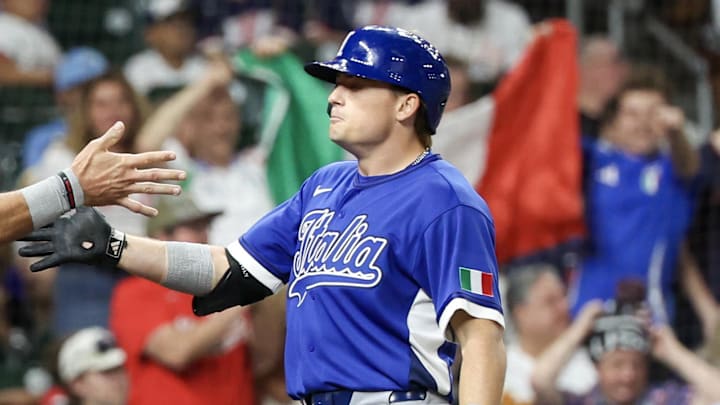 Mar 10, 2026; Houston, TX, United States;  Italy right fielder Jac Caglianone (14) celebrates Italy shortstop Sam Antonacci (10) two-run home run against the United States in the second inning at Daikin Park. Mandatory Credit: Thomas Shea-Imagn Images