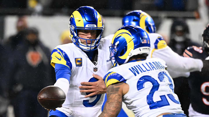 Jan 18, 2026; Chicago, IL, USA; in Los Angeles Rams quarterback Matthew Stafford (9) hands off to running back Kyren Williams (23) during an NFC Divisional Round game against the Chicago Bears at Soldier Field. Mandatory Credit: Matt Marton-Imagn Images Jan 18, 2026; Chicago, IL, USA; in Los Angeles Rams quarterback Matthew Stafford (9) hands off to running back Kyren Williams (23) during an NFC Divisional Round game against the Chicago Bears at Soldier Field. Mandatory Credit: Matt Marton-Imagn Images