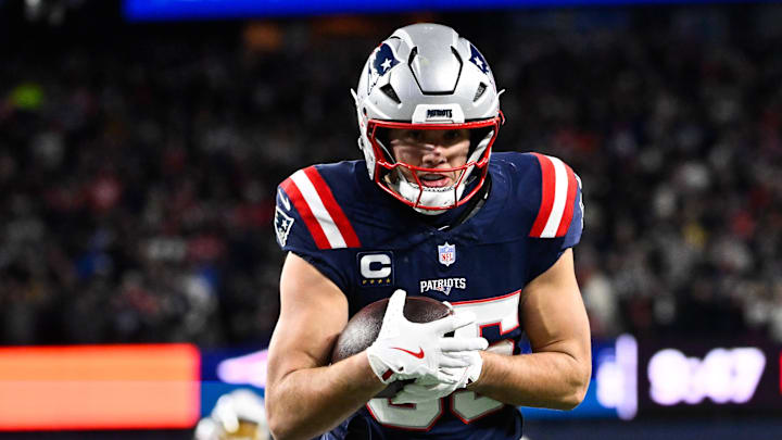 Jan 11, 2026; Foxborough, MA, USA; New England Patriots tight end Hunter Henry (85) scores a touchdown during the fourth quarter against the Los Angeles Chargers in an AFC Wild Card Round game at Gillette Stadium. Mandatory Credit: Eric Canha-Imagn Images