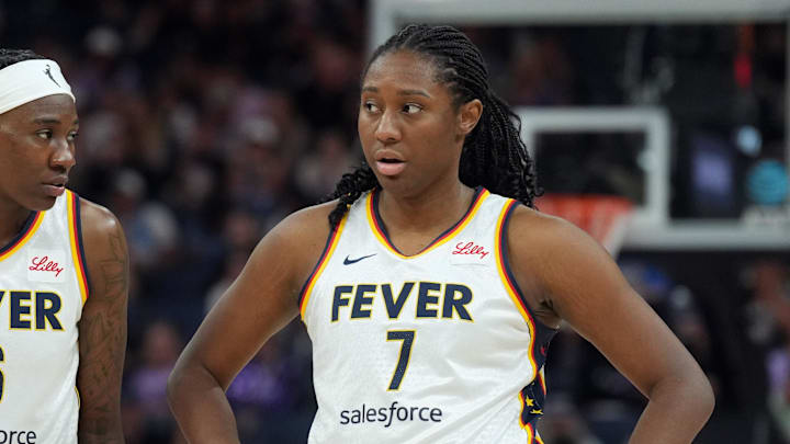 Aug 31, 2025; San Francisco, California, USA; Indiana Fever forwards Natasha Howard (6) and Aliyah Boston (7) stand on the court during the third quarter against the Golden State Valkyries at Chase Center. Mandatory Credit: Darren Yamashita-Imagn Images