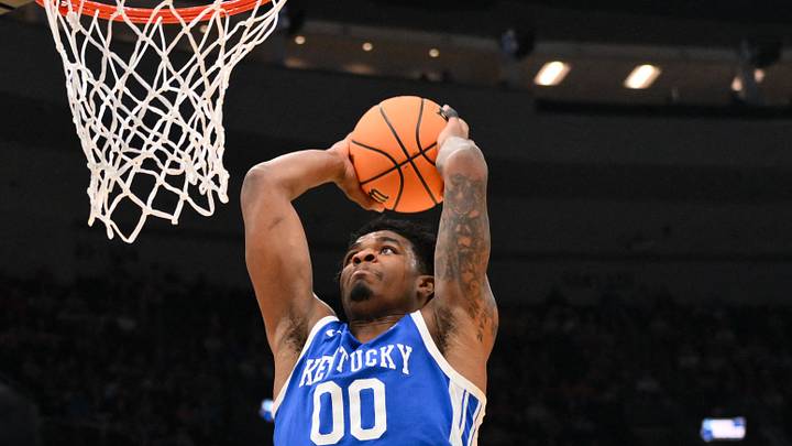 Mar 22, 2026; St. Louis, MO, USA; Kentucky Wildcats guard Otega Oweh (00) dunks during the second half against the Iowa State Cyclones during a second round game of the men's 2026 NCAA Tournament at Enterprise Center. Mandatory Credit: Jeff Curry-Imagn Images Mar 22, 2026; St. Louis, MO, USA; Kentucky Wildcats guard Otega Oweh (00) dunks during the second half against the Iowa State Cyclones during a second round game of the men's 2026 NCAA Tournament at Enterprise Center. Mandatory Credit: Jeff Curry-Imagn Images