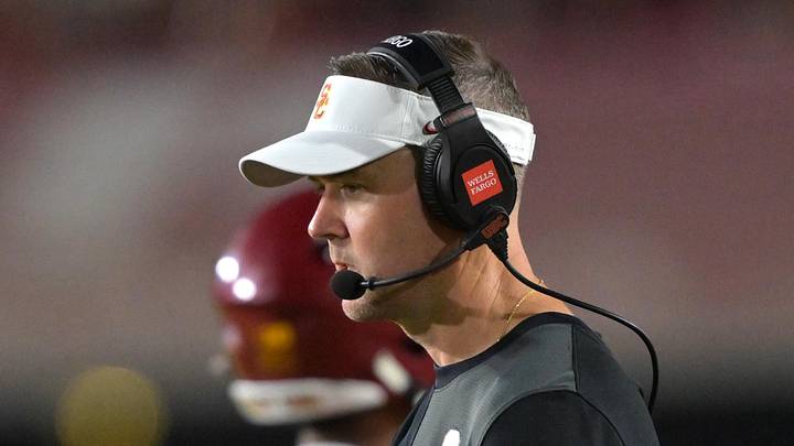 Sep 6, 2025; Los Angeles, California, USA; USC Trojans head coach Lincoln Riley shakes hands with running back Eli Sanders (1) after a touchdown during the second half against the Georgia Southern Eagles at United Airlines Field at the Los Angeles Memorial Coliseum. Mandatory Credit: Jayne Kamin-Oncea-Imagn Images Sep 6, 2025; Los Angeles, California, USA; USC Trojans head coach Lincoln Riley shakes hands with running back Eli Sanders (1) after a touchdown during the second half against the Georgia Southern Eagles at United Airlines Field at the Los Angeles Memorial Coliseum. Mandatory Credit: Jayne Kamin-Oncea-Imagn Images