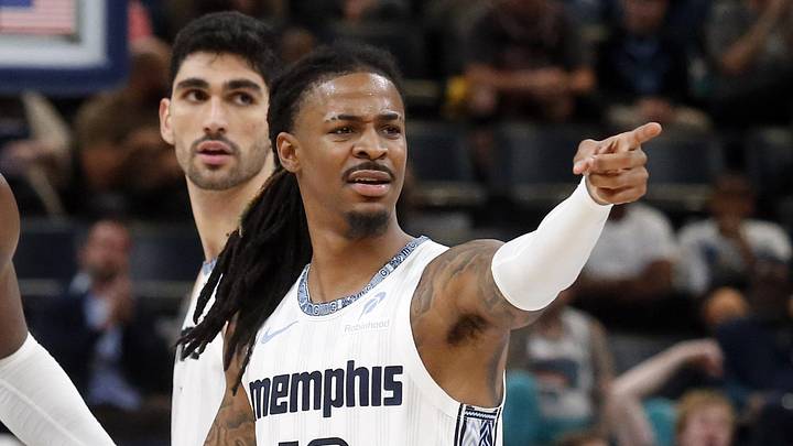 Dec 26, 2025; Memphis, Tennessee, USA; Memphis Grizzlies guard Ja Morant (12) reacts with forward/center Jaren Jackson Jr. (8) during the fourth quarter against the Milwaukee Bucks at FedExForum. Mandatory Credit: Petre Thomas-Imagn Images Dec 26, 2025; Memphis, Tennessee, USA; Memphis Grizzlies guard Ja Morant (12) reacts with forward/center Jaren Jackson Jr. (8) during the fourth quarter against the Milwaukee Bucks at FedExForum. Mandatory Credit: Petre Thomas-Imagn Images