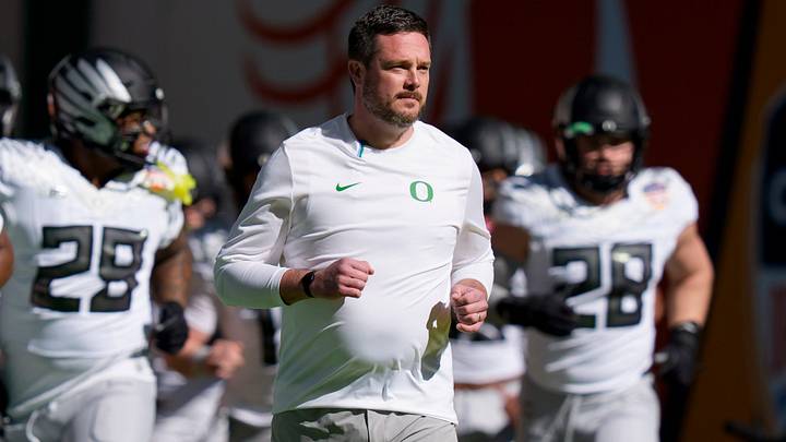 Oregon head coach Dan Lanning takes the field with his team for warmups as the Oregon Ducks take on the Texas Tech Red Raiders in the Orange Bowl on Jan. 1, 2026, at Hard Rock Stadium in Miami, Florida. Oregon head coach Dan Lanning takes the field with his team for warmups as the Oregon Ducks take on the Texas Tech Red Raiders in the Orange Bowl on Jan. 1, 2026, at Hard Rock Stadium in Miami, Florida.