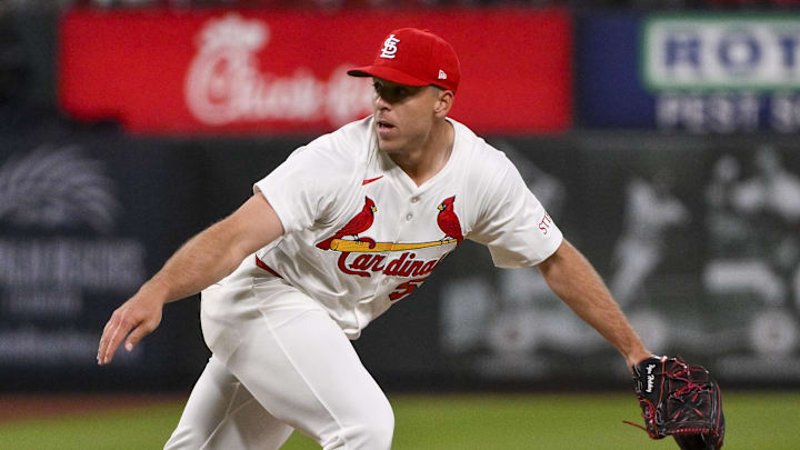Mar 27, 2025; St. Louis, Missouri, USA; St. Louis Cardinals relief pitcher Ryan Helsley (56) pitches against the Minnesota Twins during the ninth inning at Busch Stadium. Mar 27, 2025; St. Louis, Missouri, USA; St. Louis Cardinals relief pitcher Ryan Helsley (56) pitches against the Minnesota Twins during the ninth inning at Busch Stadium.