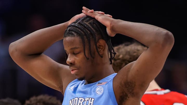 Dec 20, 2025; Atlanta, Georgia, USA; North Carolina Tar Heels forward Caleb Wilson (8) reacts after a foul against the Ohio State Buckeyes in the second half at State Farm Arena. Mandatory Credit: Brett Davis-Imagn Images
