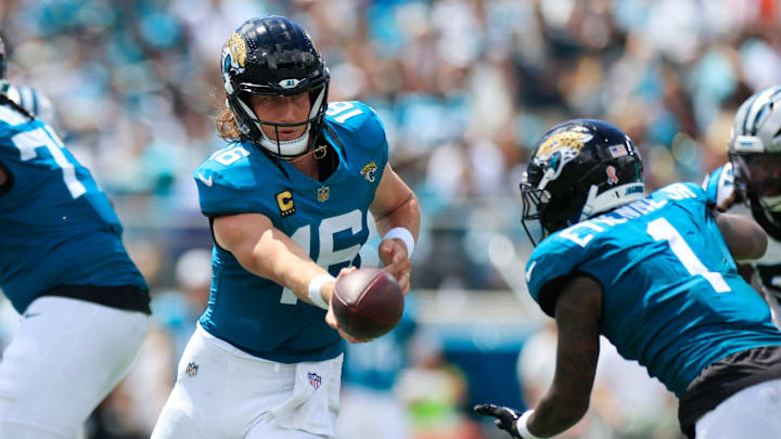 Jacksonville Jaguars quarterback Trevor Lawrence (16) hands off to running back Travis Etienne Jr. (1) during the first quarter of an NFL football matchup at EverBank Stadium, Sunday, Sept. 7, 2025 in Jacksonville, Fla. [Corey Perrine/Florida Times-Union]