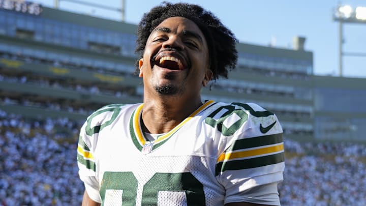 Oct 20, 2024; Green Bay, Wisconsin, USA;  Green Bay Packers wide receiver Bo Melton (80) celebrates as he runs off the field following the game against the Houston Texans at Lambeau Field. Mandatory Credit: Jeff Hanisch-Imagn Images
