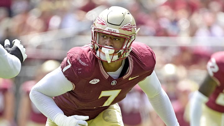 Sep 14, 2024; Tallahassee, Florida, USA; Florida State Seminoles defensive lineman Marvin Jones Jr. (7) pressures against the Memphis Tigers during the first half at Doak S. Campbell Stadium. Mandatory Credit: Melina Myers-Imagn Images