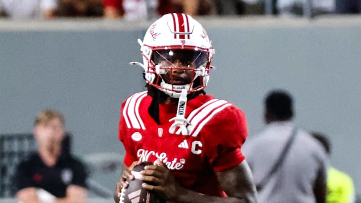 Aug 28, 2025; Raleigh, North Carolina, USA; North Carolina State Wolfpack quarterback CJ Bailey (11) runs with the ball during the second half of the game against East Carolina Pirates at Carter-Finley Stadium. Mandatory Credit: Jaylynn Nash-Imagn Images Aug 28, 2025; Raleigh, North Carolina, USA; North Carolina State Wolfpack quarterback CJ Bailey (11) runs with the ball during the second half of the game against East Carolina Pirates at Carter-Finley Stadium. Mandatory Credit: Jaylynn Nash-Imagn Images