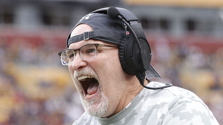 Nov 10, 2024; Landover, Maryland, USA; Washington Commanders head coach Dan Quinn celebrates on the sidelines after an interception pass against the Pittsburgh Steelers during the second half at Northwest Stadium. Mandatory Credit: Amber Searls-Imagn Images Nov 10, 2024; Landover, Maryland, USA; Washington Commanders head coach Dan Quinn celebrates on the sidelines after an interception pass against the Pittsburgh Steelers during the second half at Northwest Stadium. Mandatory Credit: Amber Searls-Imagn Images