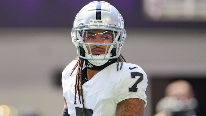 Aug 10, 2024; Minneapolis, Minnesota, USA; Las Vegas Raiders safety Tre'von Moehrig (7) warms up before the game against the Minnesota Vikings  at U.S. Bank Stadium. Mandatory Credit: Brad Rempel-Imagn Images