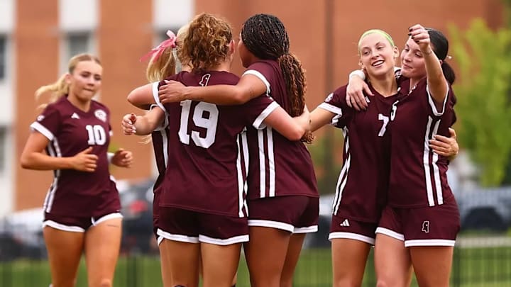 Mississippi State soccer players celebrate a goal scored in Saturday's exhibition match against Mercer.