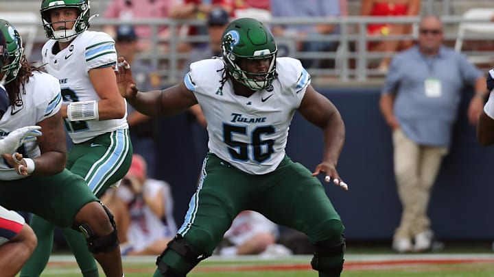 Sep 20, 2025; Oxford, Mississippi, USA; Tulane Green Wave offensive linemen Shadre Hurst (56) blocks during the first quarter against the Mississippi Rebels at Vaught-Hemingway Stadium. Mandatory Credit: Petre Thomas-Imagn Images